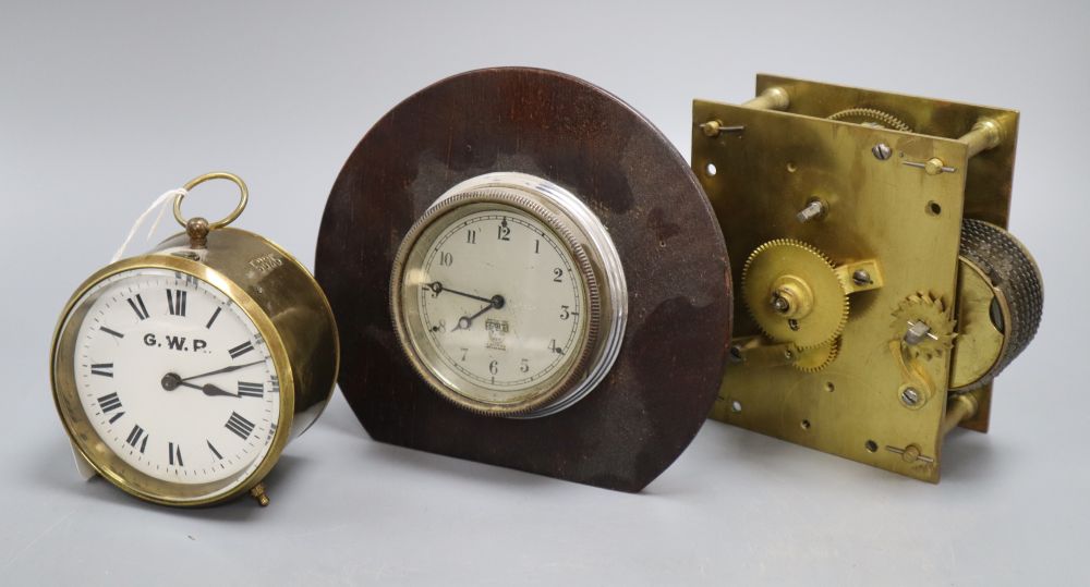 A brass GWR timepiece, a Smiths oak framed timepiece and a fusee clock movement